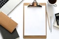 Top view over the working desk with notebook, pencil, paper, laptop cup of coffee and calculator. Copy space for text. Flat lay of Royalty Free Stock Photo