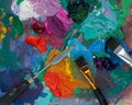 Top view, paint brush palette, different colors. The artist`s tools for real art and inspiration Royalty Free Stock Photo