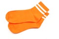 Pair of orange socks isolated on white background