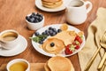 Top view of pancakes with berries