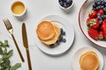 Top view of pancakes, honey, blueberries Royalty Free Stock Photo