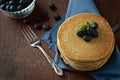 top view pancakes in a skillet with blueberries