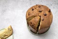 Top View Panettone Italian Sweet Cake On Table And Cut Piece. Sweet bread, Fruitcake Royalty Free Stock Photo