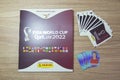 Top view of Panini Album Fifa World Cup 2022 - Qatar on the desk