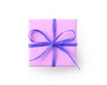 Top view of paper pink color present box with blue recycled paper ribbon isolated on white Royalty Free Stock Photo