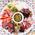 Top view of a party platter with meats and cheese