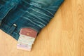 Top view. passport book and money insert on pocket jean pants wi Royalty Free Stock Photo