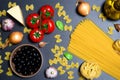 Top view: pasta or italian spaghetti on black stone slate background Royalty Free Stock Photo