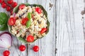 Overhead View of Tomato, Black Olive, and Feta, Pasta Salad with Freshly Chopped Basil Royalty Free Stock Photo