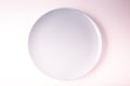 Top view of a pastel plate on a pastel peach background. Minimalism food photography. Geometric style. Royalty Free Stock Photo