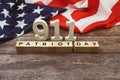 911 Patriot Day Word alphabet letters with USA flag on wooden background Royalty Free Stock Photo