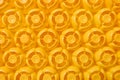 Top view pattern of yellow plastic bottle caps