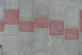 Top view of pavement made of pink and grey concrete blocks Royalty Free Stock Photo