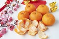 Top view of Pealed Mandarin oranges on white cover background. Chinese New Year celebration.