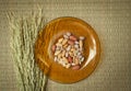 Top view,Peanut in plate on the bamboo mats background