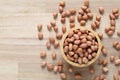 Top view of peanuts in a bowl on wooder background, Healthy eating concept Royalty Free Stock Photo