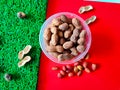 Top view of peanuts in plastic bowl Royalty Free Stock Photo