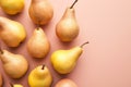 Top view of pear fruits on pink background