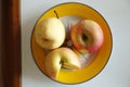 One pear and two apples Royalty Free Stock Photo