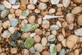 Top View of Pebble Stone on the Beach with Tiny Natural Seashells Royalty Free Stock Photo