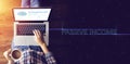 Top view of people working on notebook laptop computer from home on wooden floor with startup business and rocket logo on screen Royalty Free Stock Photo