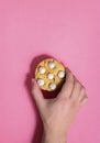 Top view of a person's hand holding the delicious and sweet chocolate chip cookie Royalty Free Stock Photo