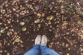 Foot and legs in autumn seen from above Royalty Free Stock Photo