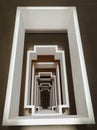 Top view perspective of concrete square shape of staircase vertical. Royalty Free Stock Photo