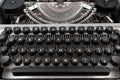 Top view photo of all keyboard and keys with letters of an old and vintage typewriter, selective focus Royalty Free Stock Photo