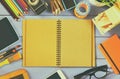 Top view photo of blank notebook, old camera and school supplies Royalty Free Stock Photo