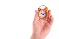 Top view photo of classic little orange alarm clock isolated over white backdrop Royalty Free Stock Photo