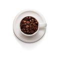 Top View Photo of a Coffee cup filled with coffee beans and saucer isolated on white background Royalty Free Stock Photo