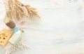 Top view photo of dairy products over white wooden background. Symbols of jewish holiday - Shavuot