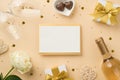 Top view photo of envelope card white gift boxes wineglasses wine bottle sequins rattan hearts heart shaped saucer with candies