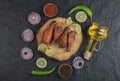 Top view of photo grilled chicken legs with vegetables