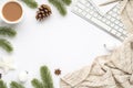 Top view photo of notepad pen keyboard cup of hot drinking white christmas tree decorations balls star pine twigs cone anise and Royalty Free Stock Photo