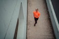 Top view photo of omen in sports clothes running in a modern urban environment. The concept of a sporty and healthy Royalty Free Stock Photo