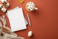 Top view photo of open diary pen knitted plaid cup of cocoa with marshmallow on rattan placemat dried orange slices cinnamon Royalty Free Stock Photo