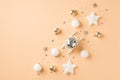 Top view photo of row composition white and golden christmas tree decorations small sleigh with disco ball stars and confetti on Royalty Free Stock Photo