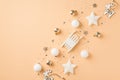 Top view photo of row composition white and golden christmas tree decorations small sleigh reindeer balls stars and sequins on