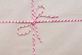 Top view photo of String or tied in bow on brown paper packaging. top view Royalty Free Stock Photo