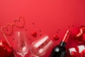 Top view photo of valentine`s day decorations gift box heart shaped paper glasses balloons two wineglasses wine bottle and red