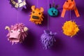 Top view photo of a variety of colorful piÃ±atas in different shapes and sizes