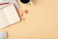 Top view photo of white keyboard mouse stationery open red reminder pencil binder clip pin and cup of coffee on isolated beige Royalty Free Stock Photo