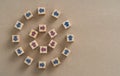 Top view photo of wooden blocks with arrows pointing opposite direction.