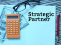 Top view phrase strategic partner written on notebook