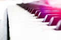 Top view of piano keys. Close-up of piano keys. Close frontal view. Piano keyboard with selective focus. Diagonal view. Piano