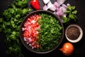 top view of pico de gallo ingredients mixed in a bowl