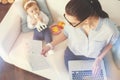 Top view picture of busy mum and her daughter Royalty Free Stock Photo