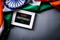 Top view of picture frame with National Flag of India on gray background. Indian Independence Day Royalty Free Stock Photo